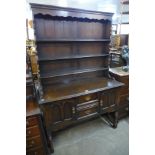 A carved oak dresser