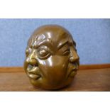 A bronze four faced Buddha, 12cms h
