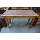 An Arts and Crafts oak altar table, 86cms h, 130cms L, 53cms w.