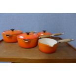 A set of four French Cousances cast iron and enamelled saucepans