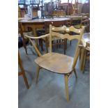 An Ercol Blonde elm and beech 493 model chair