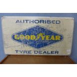 An aluminium Goodyear sign