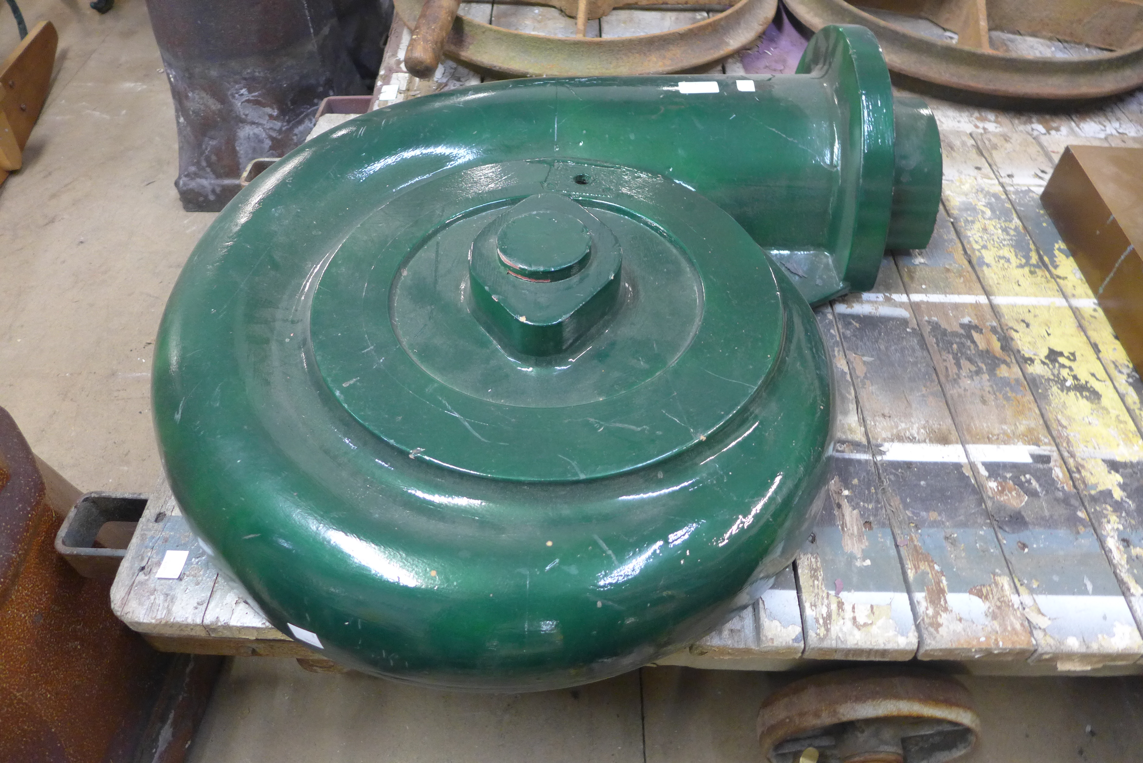 A green painted wooden mould