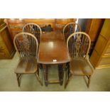 An oak barleytwist gateleg table and four chairs