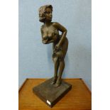 A large bronze figure of a female nude holding a jug, 74cm h