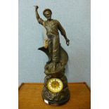 A large 19th Century spelter figural mantel clock, titled Cod Fishing, 75cms h