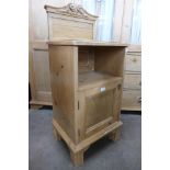 A French carved pine pot cupboard, 105cms h, 44cms w, 36cms d.