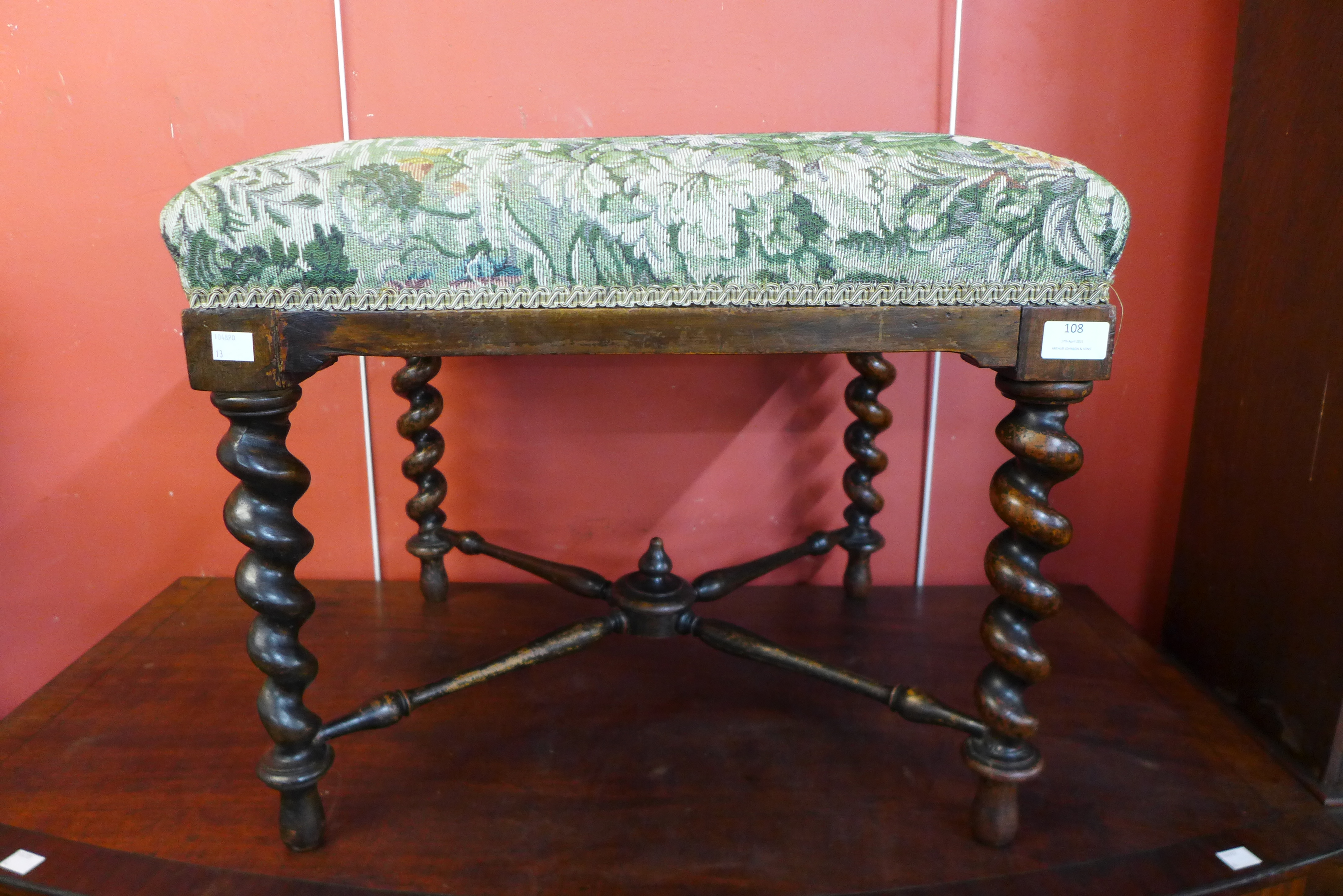 A Victorian mahogany and upholstered footstool