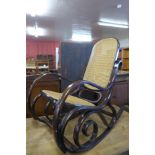 A beech bentwood bergere rocking chair