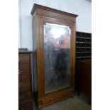 A French fruitwood armoire a/f