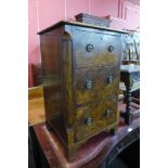 A small burr walnut chest of drawers, 70cms h, 44cms w, 40cms d.