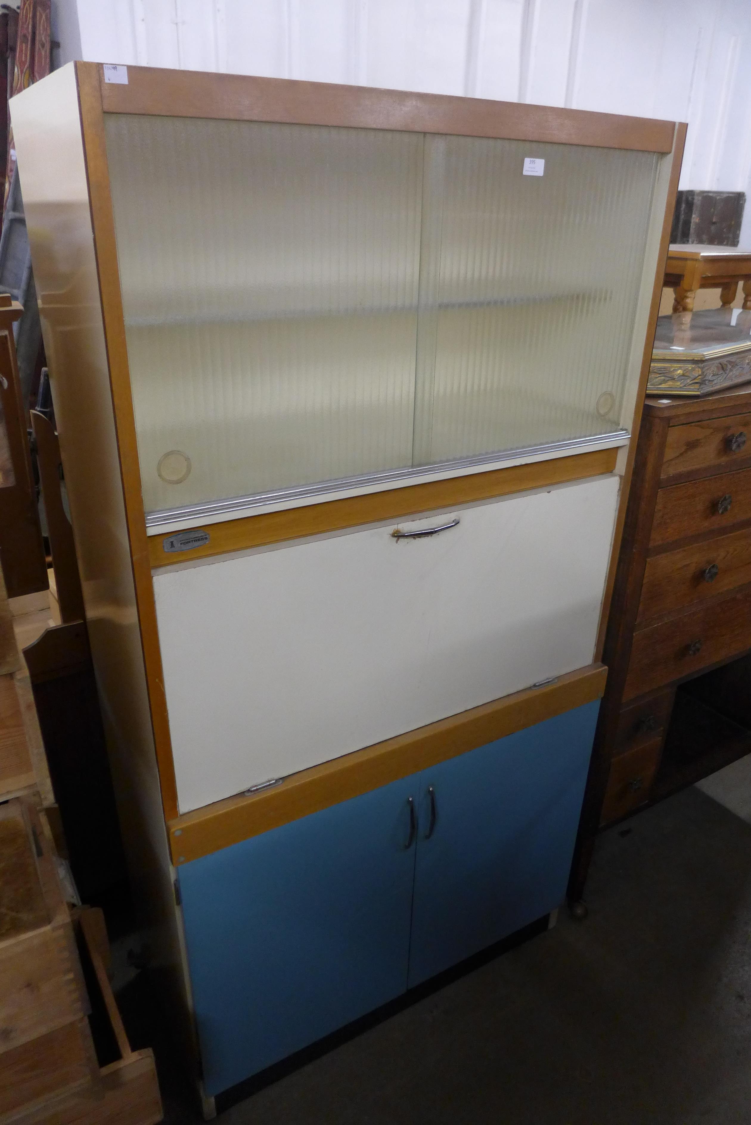 A vintage 1960's painted kitchen cabinet