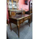 A French Louis XV style inlaid walnut, gilt metal and marble topped bonheur de jour, 110cms h,