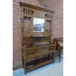 A Victorian carved oak hallstand, 208cms h, 135cms w, 35cms d.