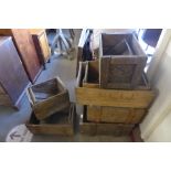 Assorted wooden advertising crates