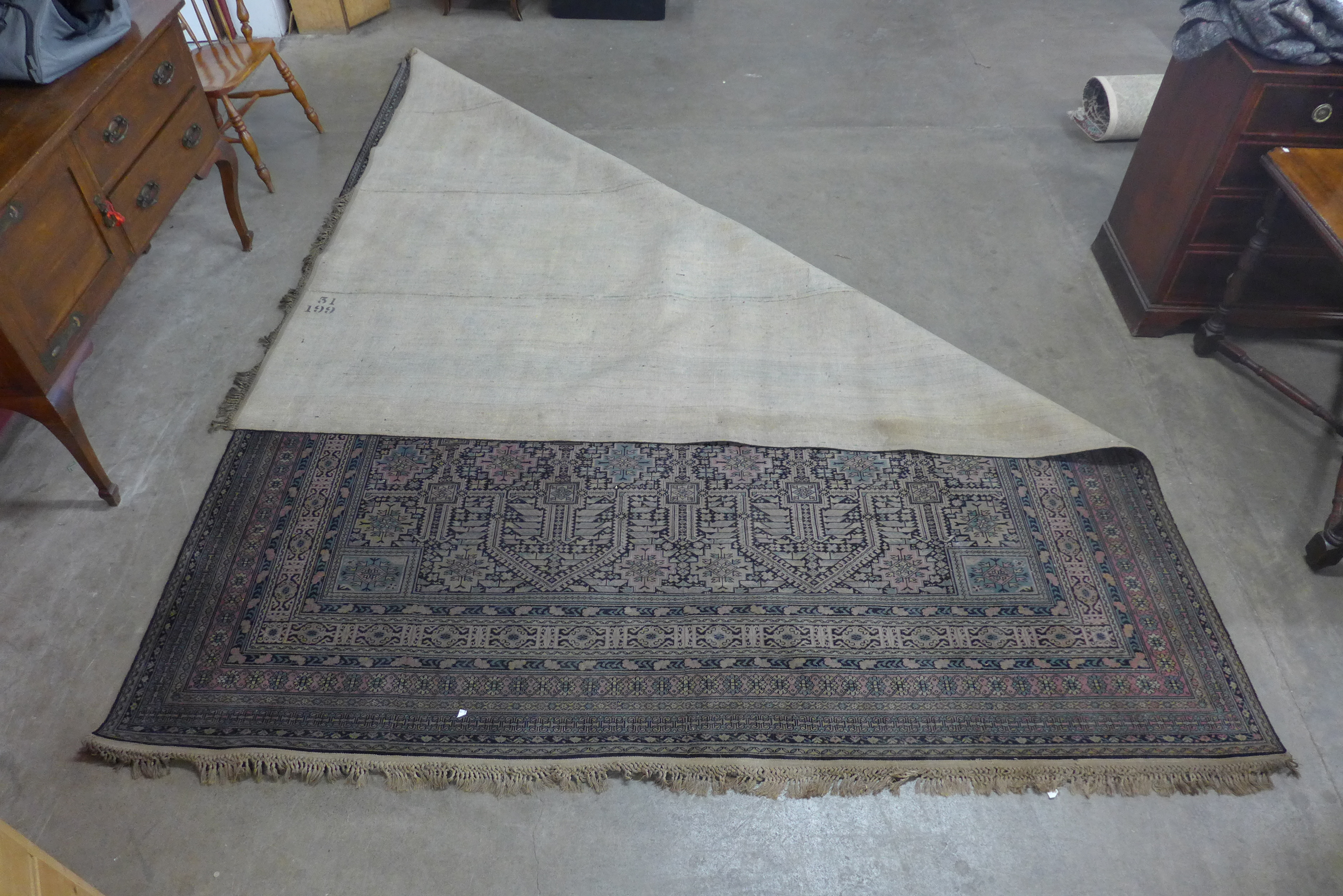 A large blue, red and black ground rug - Image 2 of 2