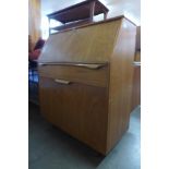 An S-Form teak bureau