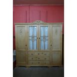 A French pine four door wardrobe, 203cms h, 205cms w, 52cms d.