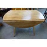 An Ercol dropleaf table