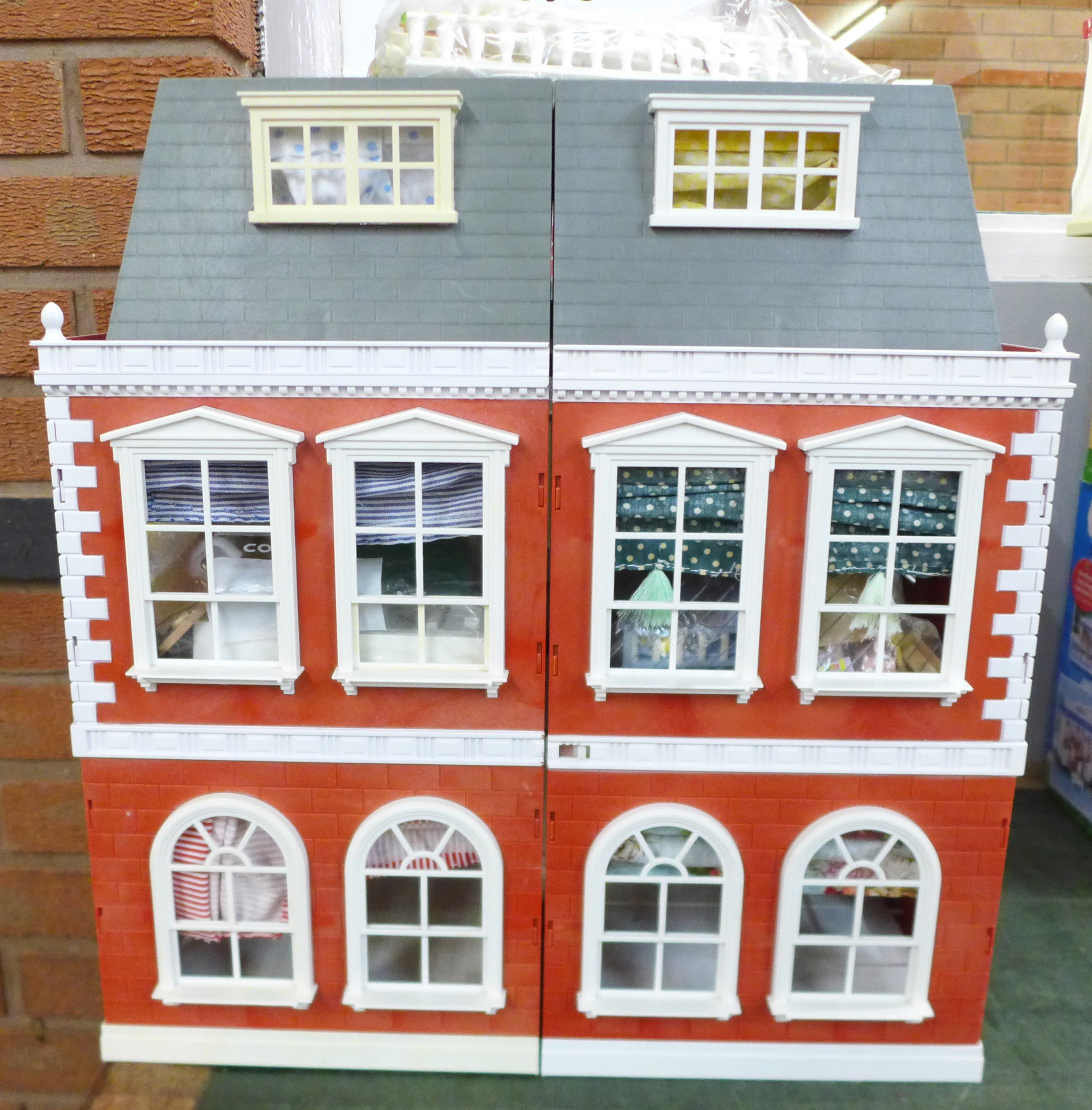 A Sylvanian Families mansion with contents (furniture)