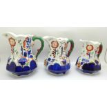 A group of three graduated hand painted jugs decorated in the Gaudy Welsh style, circa 1920, 10cm to