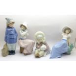 Four Nao by Lladro figurines, 'Listening to the Birds Song' (Nao ref. 02001042), 'A Big Hug' (Nao