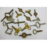 Sixteen assorted clock keys