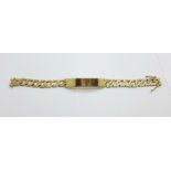 A 9ct gold bark design ID bracelet, 29.5g