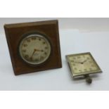 A C. Bucherer travel clock, no case, and an 8 Days travel clock