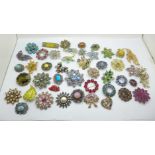 A collection of forty-five brooches