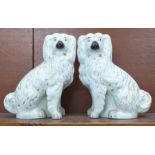 A pair of Victorian 'open legs' Staffordshire spaniels, 31cm