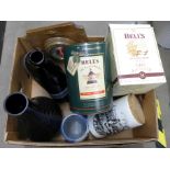 Four Bell's Whisky decanters, lacking contents, three glass vases, a storage jar and barometer **