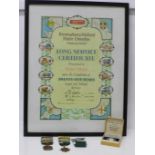 Bus memorabilia; a framed Long Service certificate and two Safe Driving medallions and badge