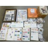 A collection of stamps and a reference book