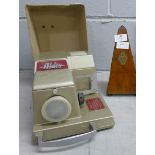 A vintage Maelzel metronome and an Aldis 35mm slide projector **PLEASE NOTE THIS LOT IS NOT ELIGIBLE