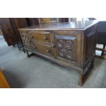 A 17th Century style carved oak dresser