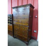 A George III style inlaid mahogany chest on chest