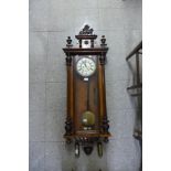 A 19th Century Gustav Becker walnut double weight Vienna wall clock