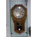 An American oak wall clock