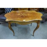 A French Louis XV style inlaid rosewood and gilt metal mounted serpentine centre table