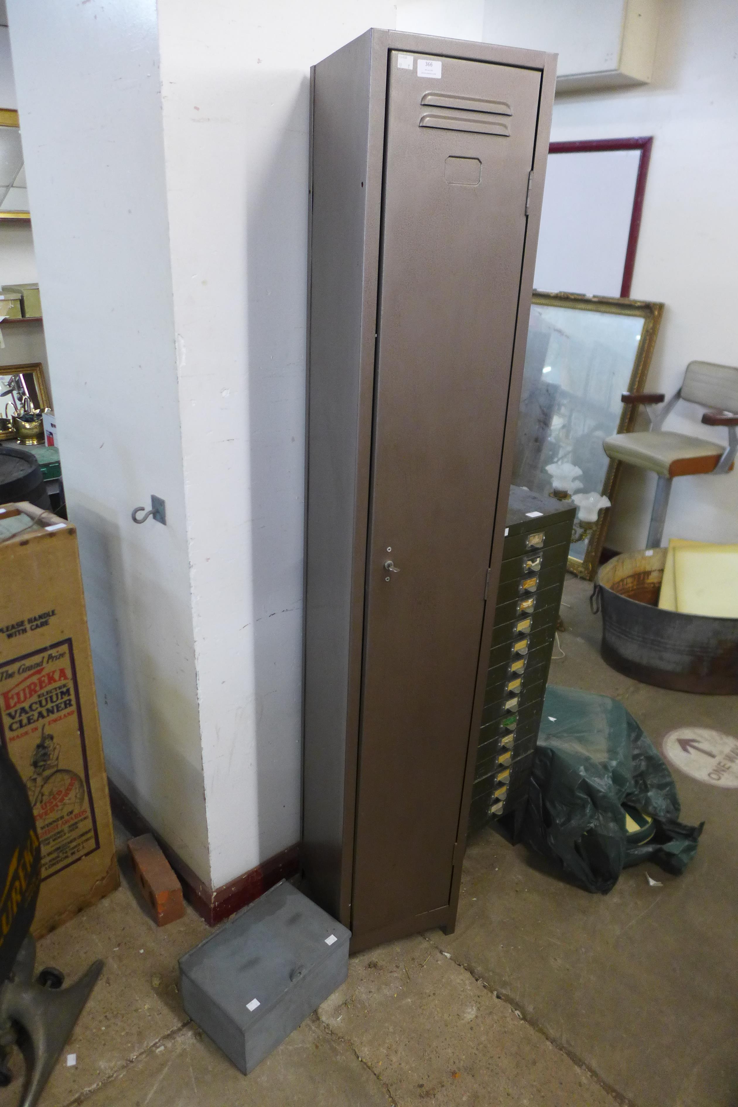 A steel gun cabinet and an ammunition box