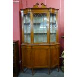 A late Victorian Sheraton Revival inlaid satinwood display cabinet, 224cms h, 126cms w, 45cms d.