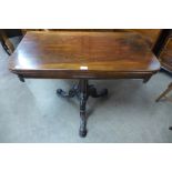 An early Victorian rosewood D-shaped fold over tea table