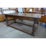 A 17th Century style carved oak refectory table