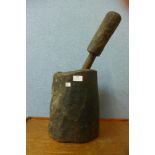 A carved hardwood pestle and mortar, possibly Native American, 56cm