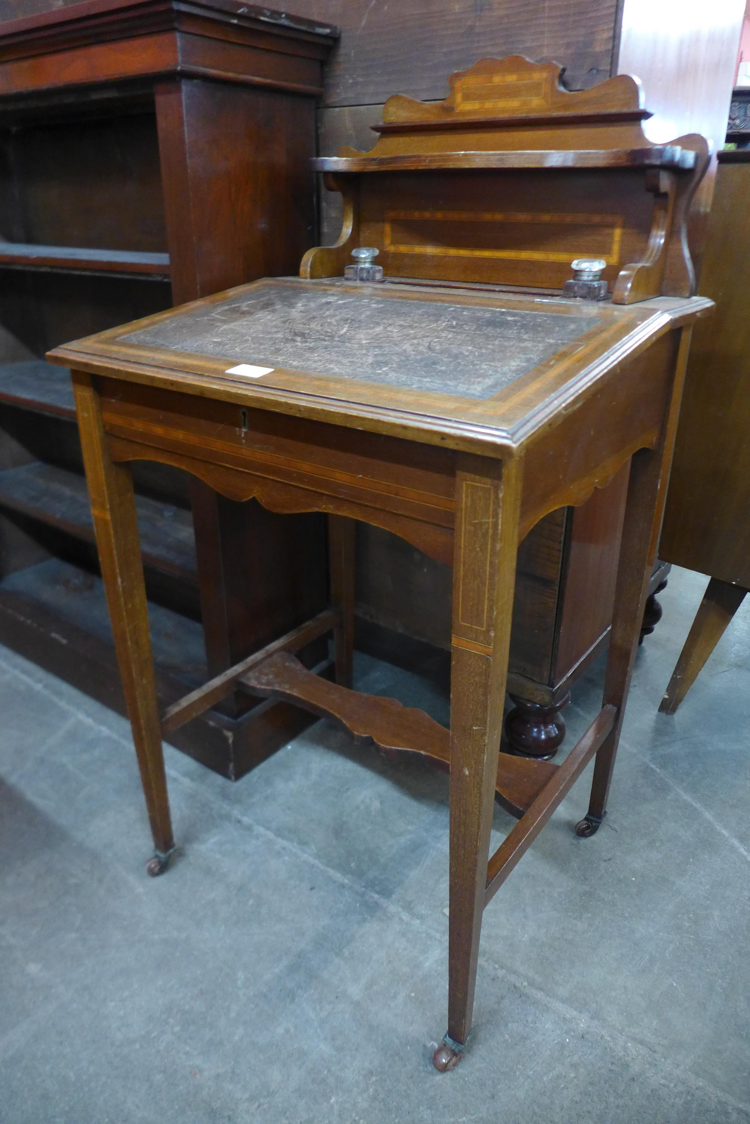 An Edward VII inlaid mahogany Davenport top desk