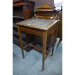 An Edward VII inlaid mahogany Davenport top desk