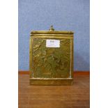 A brass tea caddy