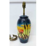A large Moorcroft Reeds at Sunset table lamp, 28.5cm