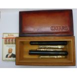 A box with mixed cigars, a sealed box of King Edward Invincible Deluxe, and six others
